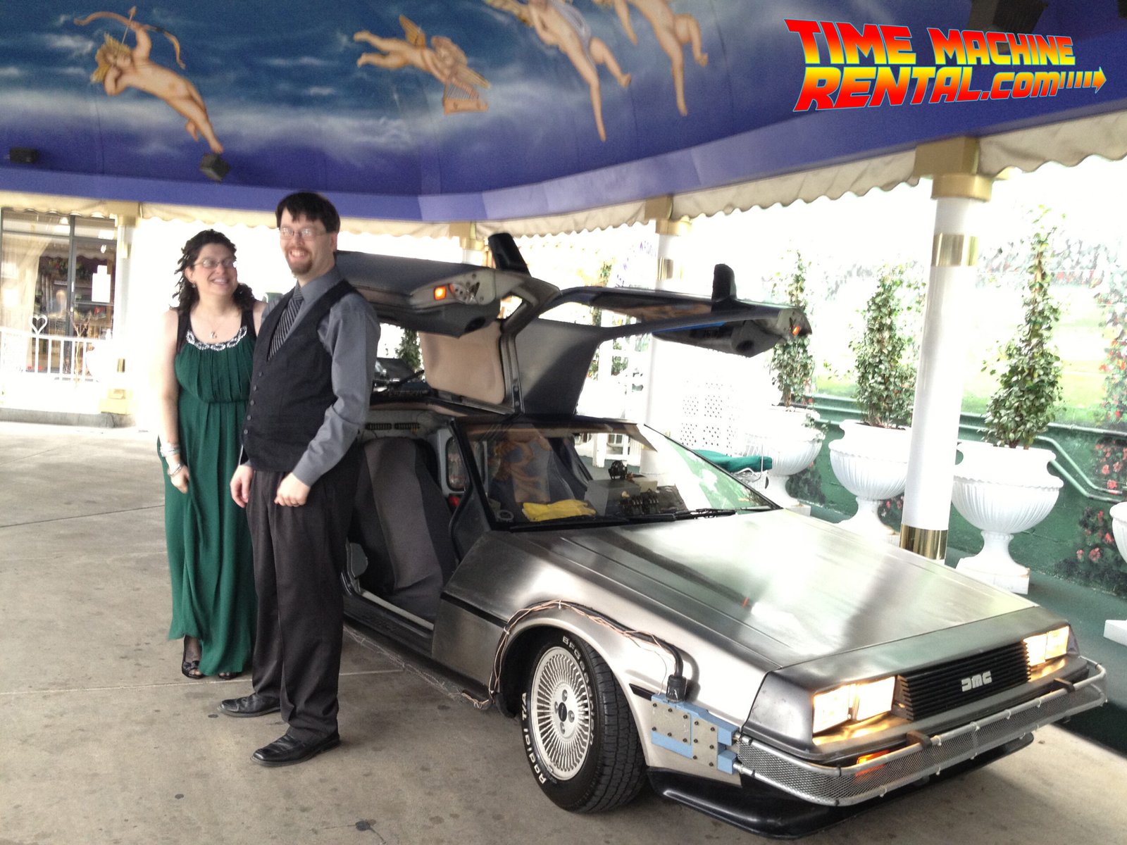 The happy couple posing alongside temporal experiment #2: The Wedding!